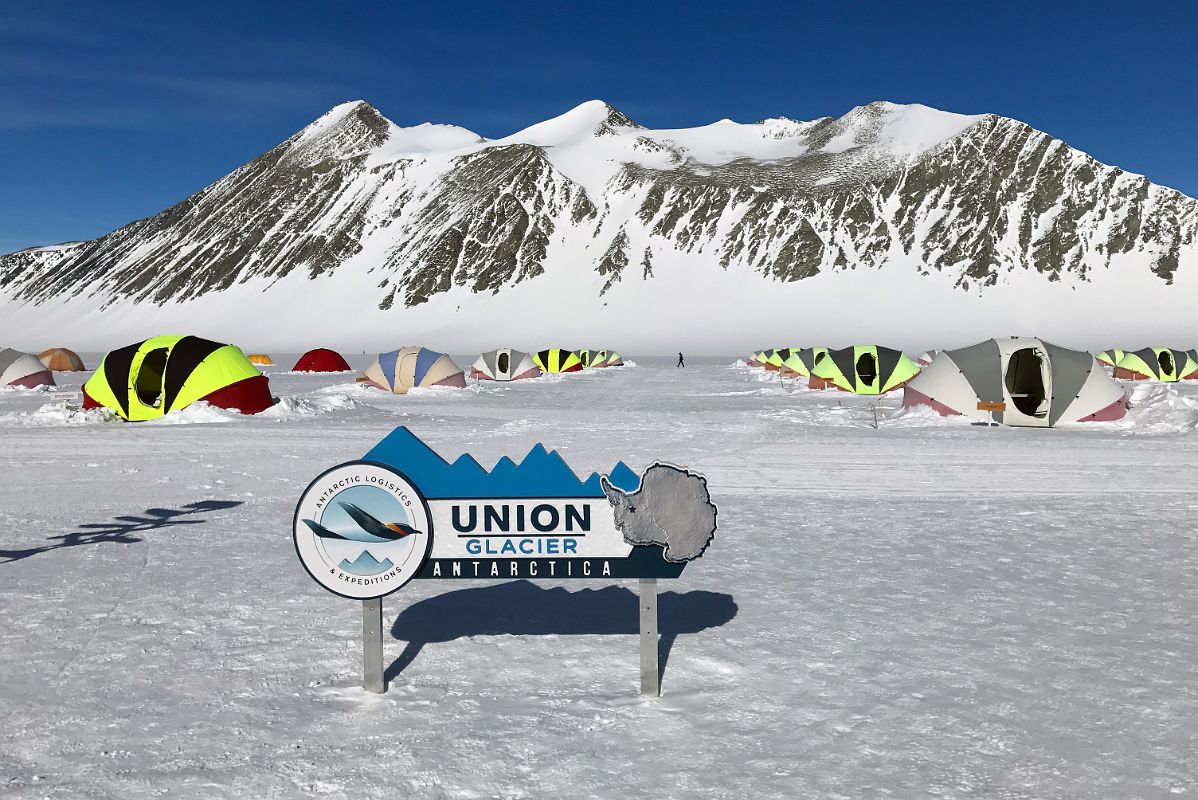 02A ALE Union Glacier Antarctica Sign And Very Comfortable Clam Tents With Mount Rossmann Beyond